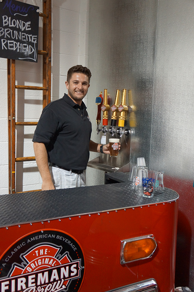 COO Dave Johnson pouring himself a Blonde at LA's most exclusive tap room, the man cave for firefighters only.