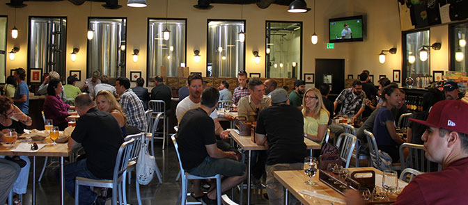 The Bruery's Tasting Room with the brewery itself lurking in the windows