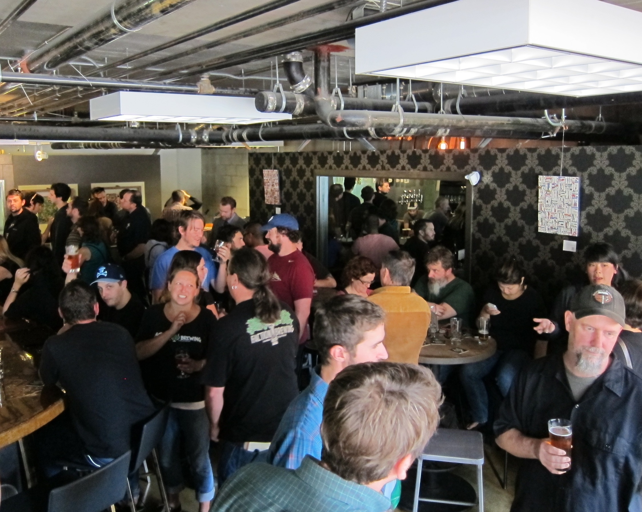 Roger Davis (bottom right) at Faction Brewing's City Beer release party