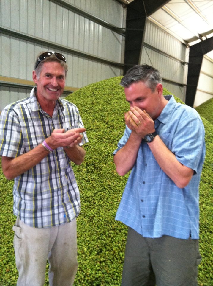 Man those Russian River people love hops. Head Brewer Vinnie Cilurzo right picks out hops in Yakima. Photo courtesy of Russian River Brewing Company