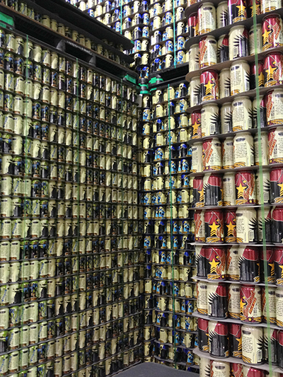 Close-up of the tower of cans at Nebraska Brewings new facility.