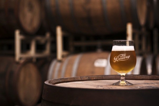 Bruery glass on barrel 1