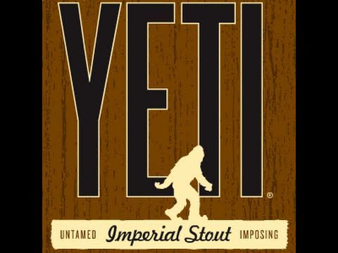 A label for Great Divide Yeti Imperial Stout featuring large block letters spelling "YETI" above a silhouette of a Sasquatch walking.