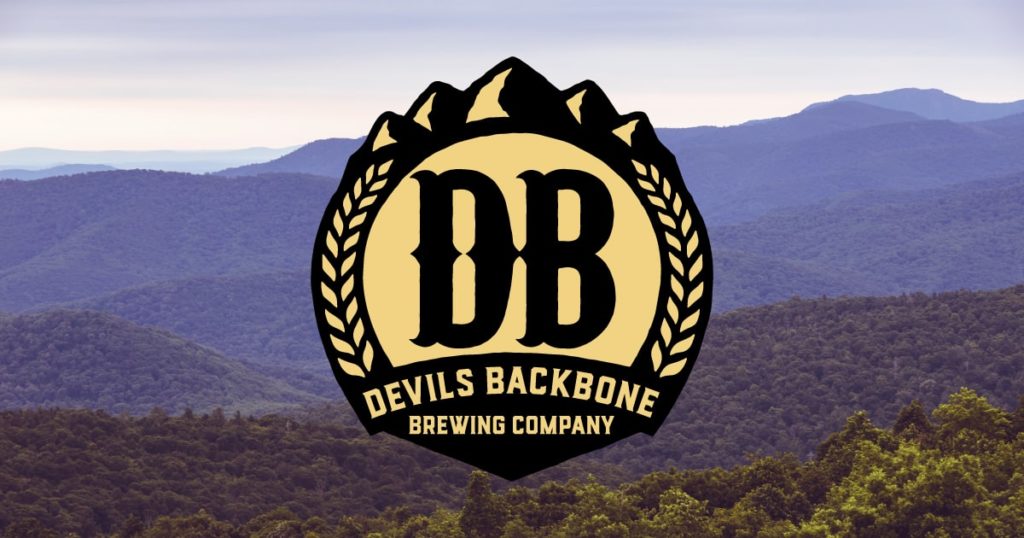Logo for Devils Backbone Brewing Company against a background of mountains