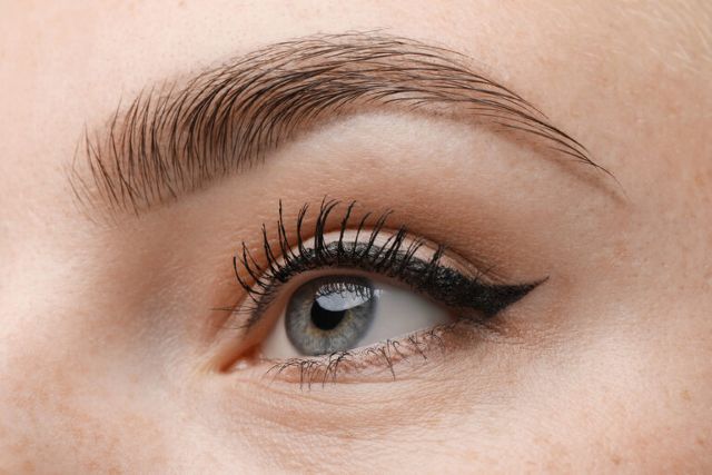 Close-Up of Sculpted Eyebrow and Winged Eyeliner