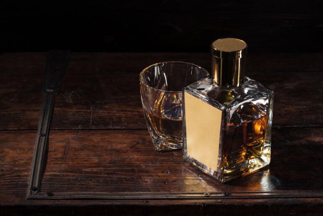 The Antiquary 21-Year-Old, a silver-age contender, premium whisky with glass on rustic wood