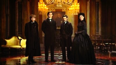 Louis Partridge, Emily Fairn, Anthony Boyle, and Fionn O'Shea in period costumes as the cast of 'House of Guinness' in a lavish, opulent setting"