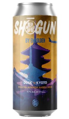 Embolden's Shogun Dusk in Kyoto Hojicha Lager can. The image displays a beer can with a distinct illustration of a pagoda-like structure and a rising sun design, against a golden and blue sky. The text on the can indicates the product is a "Kyoto Hojicha Japanese Amber Lager" with a 5.7% alcohol content by volume. It is part of the "Shogun" series by Embolden Beer Company and is described as the world's first beer to feature ceremonial grade Hojicha tea