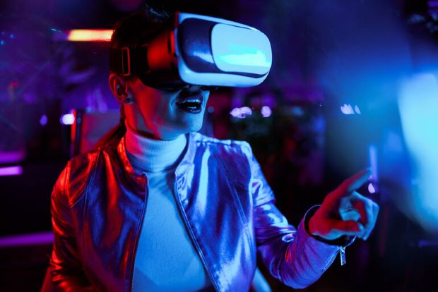 Canadian player exploring VR casino innovations with futuristic neon visuals