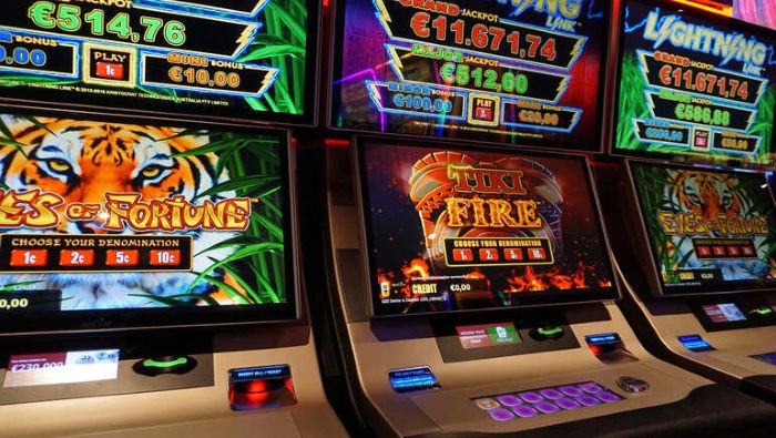 Slot machines at an Australian casino featuring Eyes of Fortune and Tiki Fire games