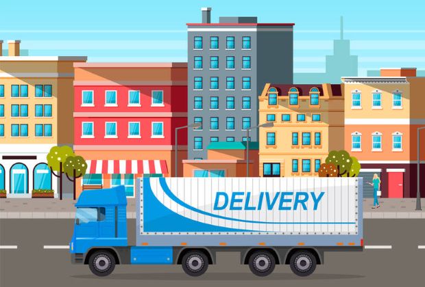 A large blue and white delivery truck drives through a busy city street with colorful buildings and pedestrians.