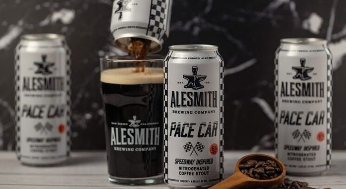 "Alesmith Pace Car coffee stout being poured from can into glass.