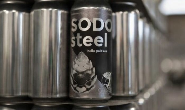 A Sodo Steel India Pale Ale can sits among other blank silver cans.