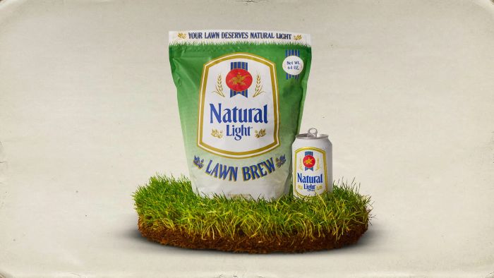 An advertisement for "Natural Light Lawn Brew" showing a large bag of lawn seed and a matching beer can sitting on a small patch of grass.