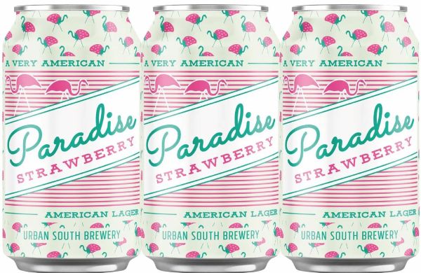 Three 12-ounce cans of Urban South Brewery's Paradise Park Strawberry Lager are displayed side-by-side. The labels feature a repeating pink flamingo and strawberry pattern on a pale background.