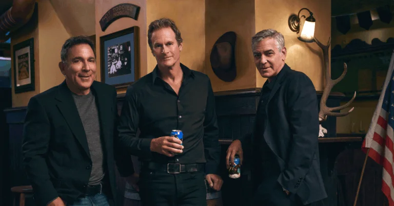 Mike Meldman, Rande Gerber, and George Clooney—celebrating the launch of their new non-alcoholic beer brand, Crazy Mountain.