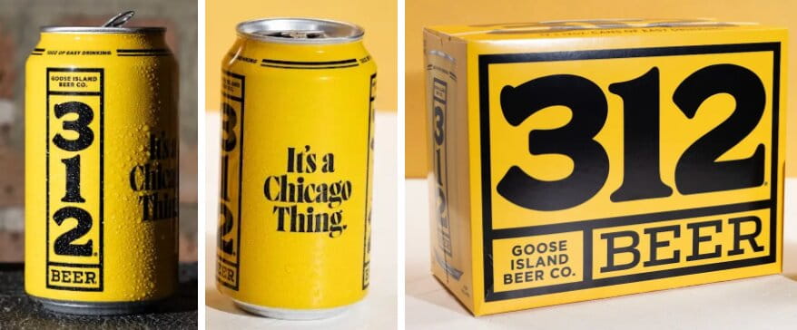 Yellow cans and packaging for Goose Island Beer Co. 312 Urban Wheat Ale, featuring bold black "312" branding and the slogan "It's a Chicago Thing."