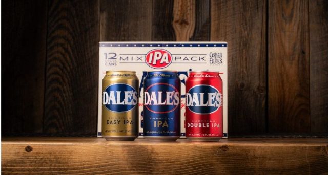 A 12-pack box and three cans of Oskar Blues Dale's IPA—Easy IPA, American IPA, and Double IPA—displayed against a rustic wooden background.