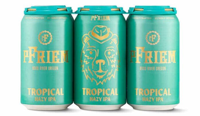 Three teal cans of pFriem Tropical Hazy IPA.
