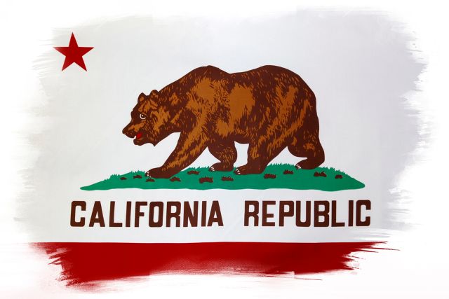 California Republic flag with a red star, grizzly bear, and red stripe.