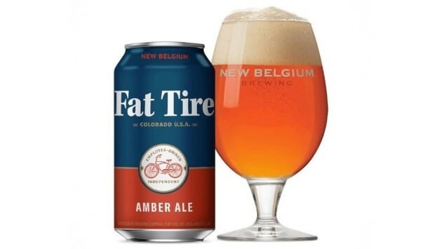 A can and a glass of New Belgium Fat Tire Amber Ale.