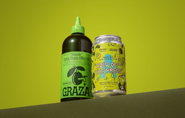 thletic Brewing Cold Off The Press non-alcoholic beer can beside a bottle of Graza extra virgin olive oil.