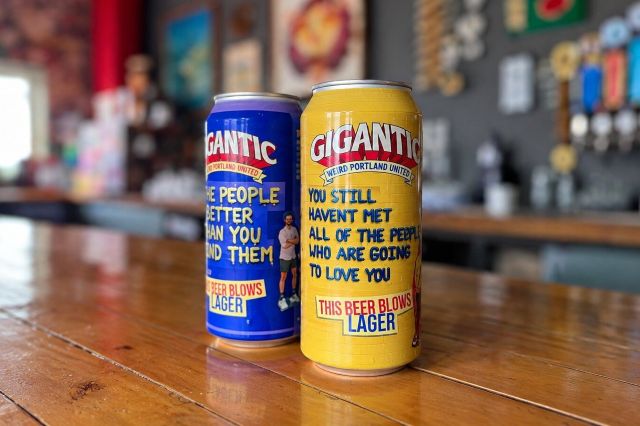 Gigantic Brewing This Beer Blows lager cans on a wooden bar at the brewery in Portland, Oregon.