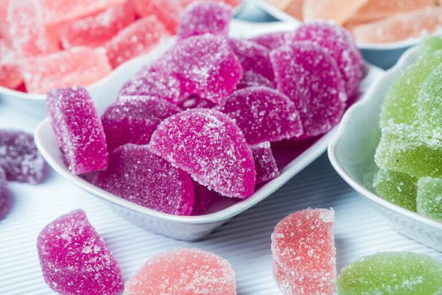 Kava gummies arranged neatly in a tray.
